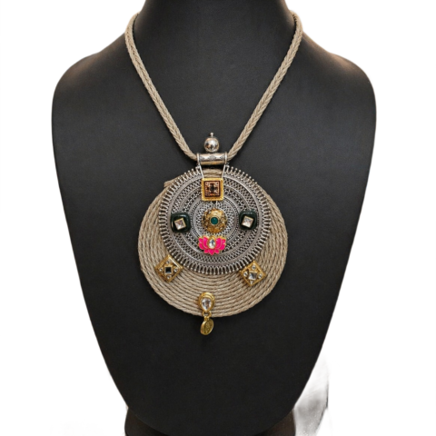 Handcrafted sxtatement pendant necklace with stone detailing and artisan design