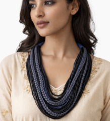 Handcrafted multi layer braided cord statement necklace in black and grey